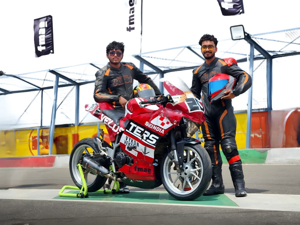Velosters team riders Shravan and Adin Sheikh with their racing motorcycle