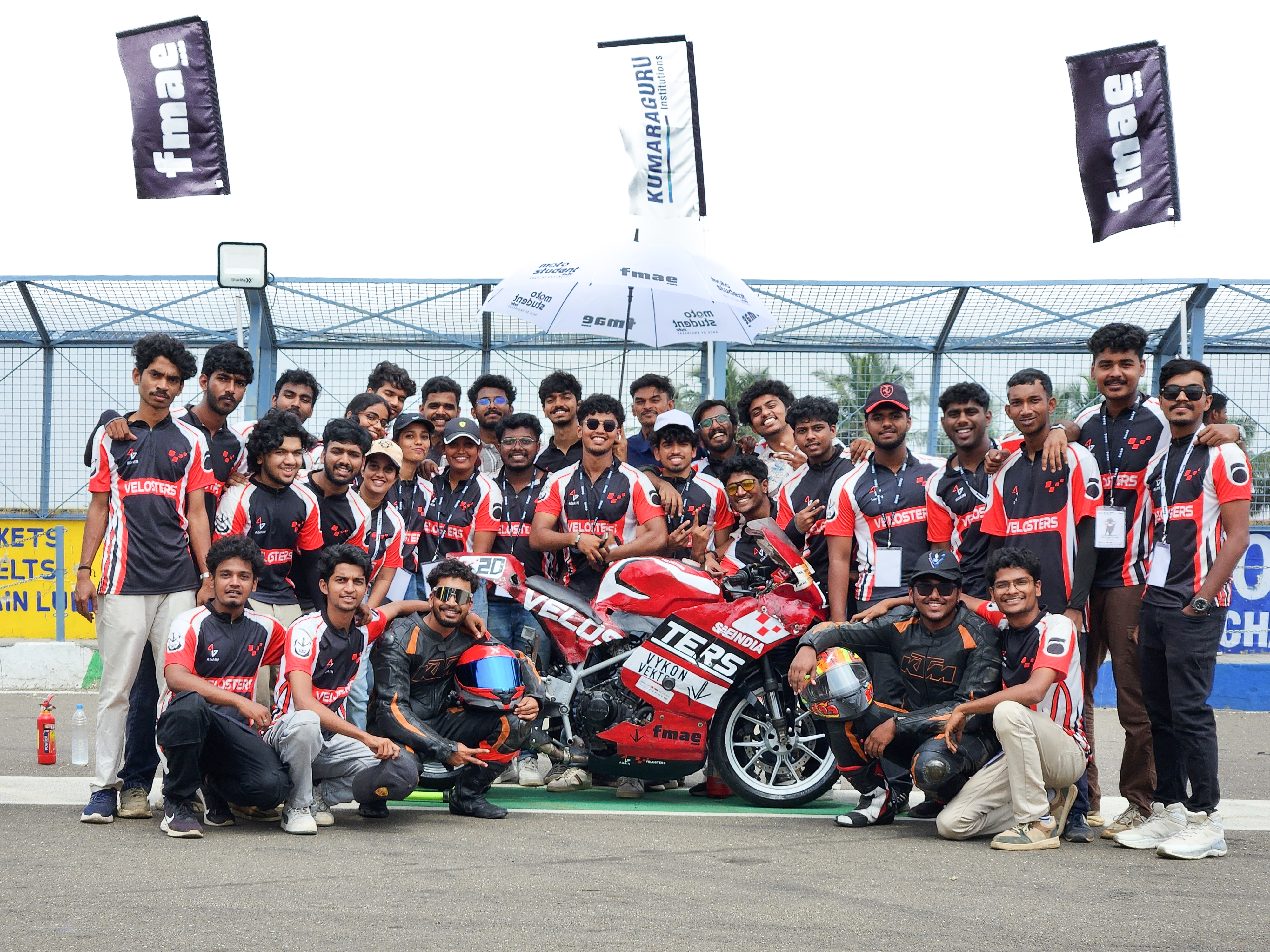 Velosters race motorcycle and student engineering crew